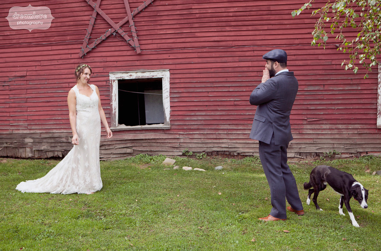 A bride and groom react to seeing each other for the first time before their wedding at the Lareau Farm Inn. They even included their dog in the first look! 