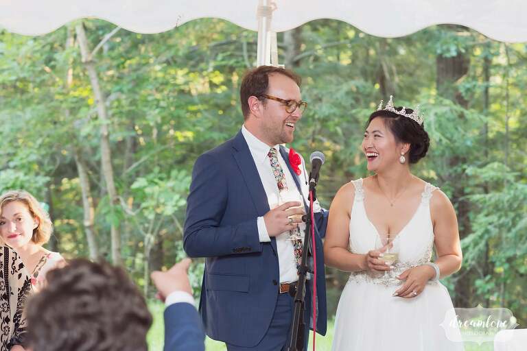 Bride and groom give speech at NH wedding.