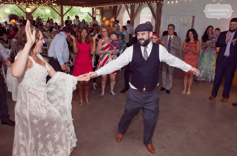 A bride and groom share their first dance under the pavilion at the Lareau Farm Inn. 