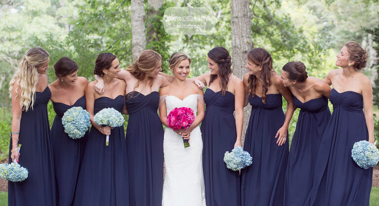 Bride with her bridesmaids at this woodsy Cape Cod wedding in MA.