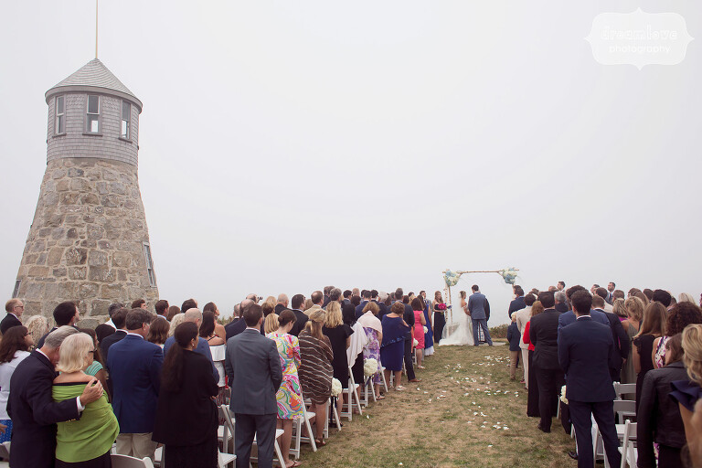 Point Gammon lighthouse wedding ceremony on the beach on Cape Cod.