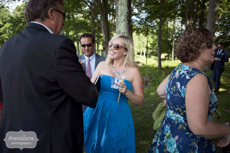 Wedding guests mingle before the outdoor ceremony at Sugarbush in VT.