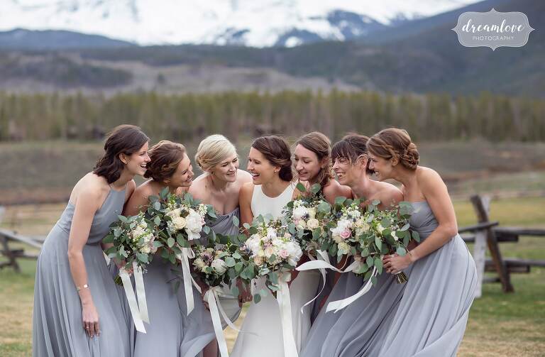 Bride tribe huddled photo in Colorado.