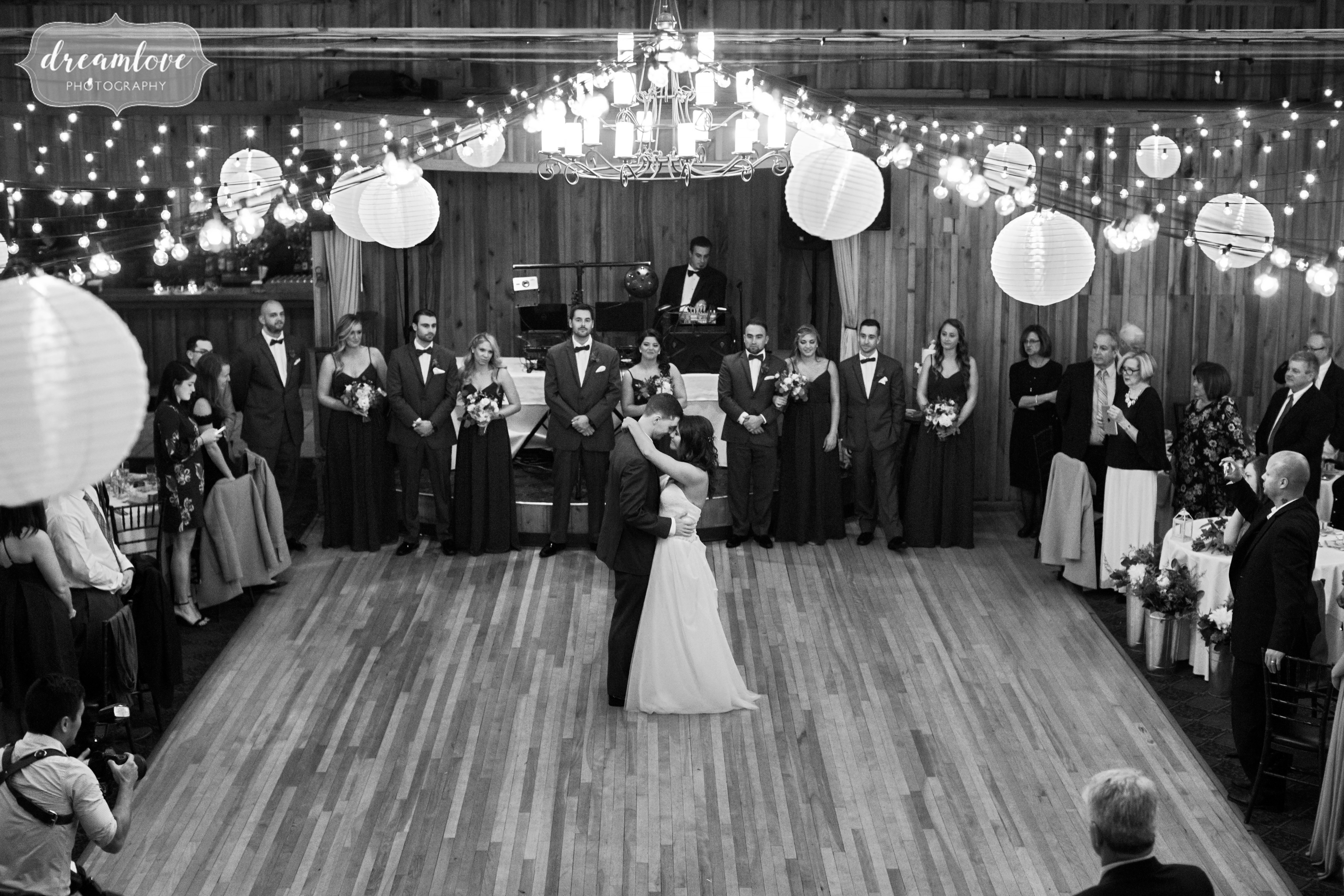 The bride and groom have their first dance in this timeless photo at the Pavilion on Crystal Lake in CT.