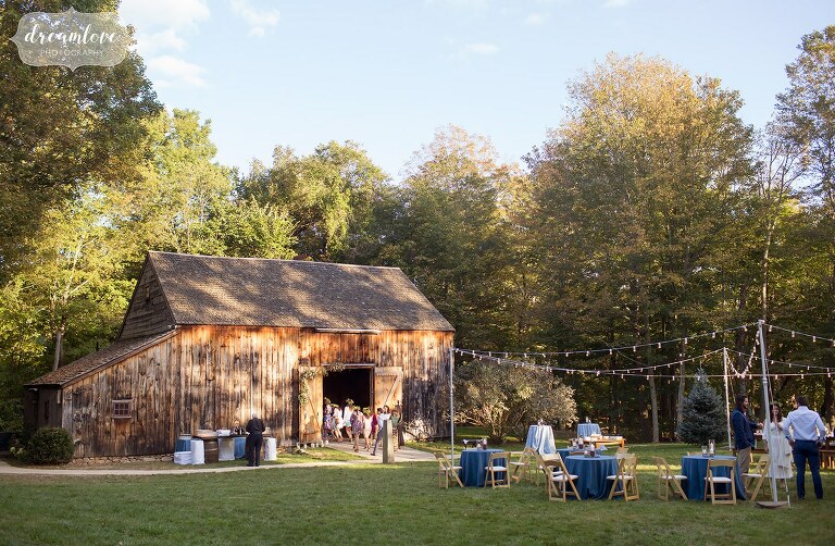 The rustic Gould Barn wedding venue set for a rehearsal dinner in Topsfield, MA.
