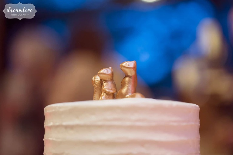 Golden squirrel cake toppers at this quirky Boston wedding.
