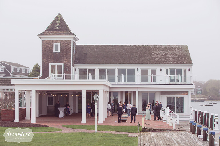 View of the outside of the Wychmere Resort for a wedding reception with an ocean view.