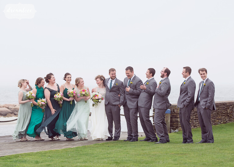 We loved this fun wedding party photo on the beach outside of the Wychmere on Cape Cod.