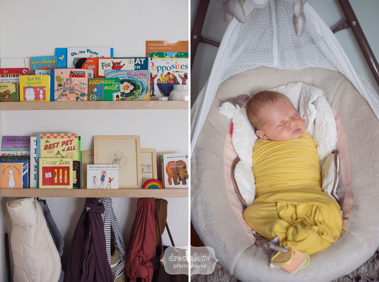 Unique baby portrait with baby books and in a yellow swaddle.