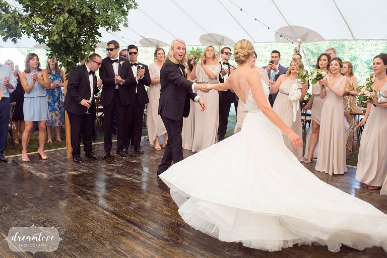 Amazing photos of the bride spinning in dress at One Barn Farm.