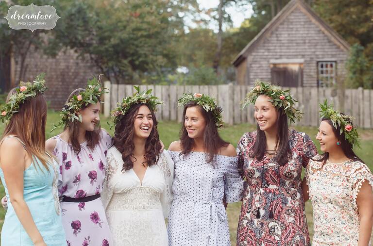 Bridesmaids wear flower crowns for this bohemian Gould Barn rehearsal dinner.