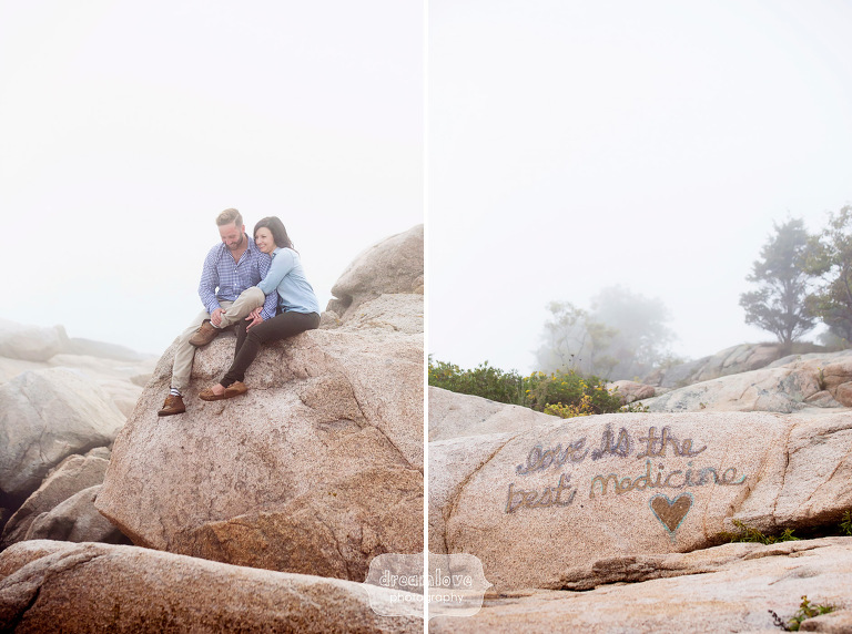 Romantic photo of the couple sitting on the rocks during their Coolidge Reservation engagement session on the coast.