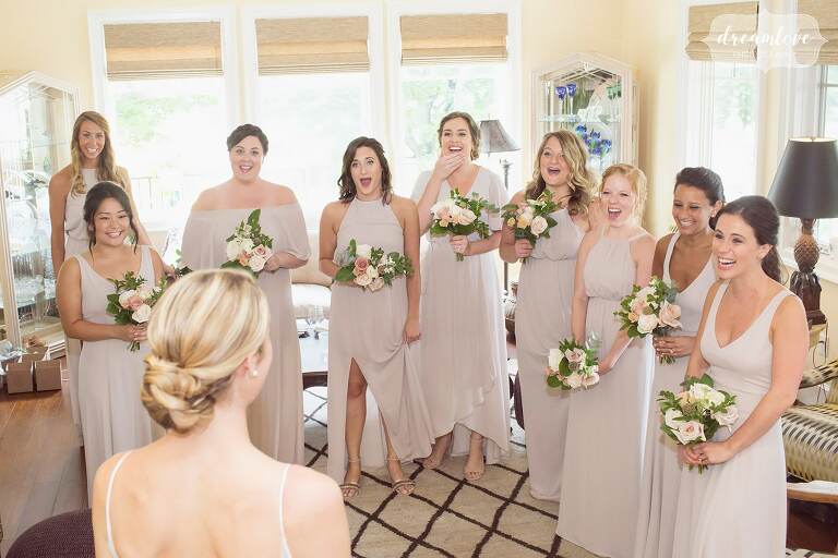 The bridesmaids have their first look seeing the bride in her Kleinfeld gown in PA.