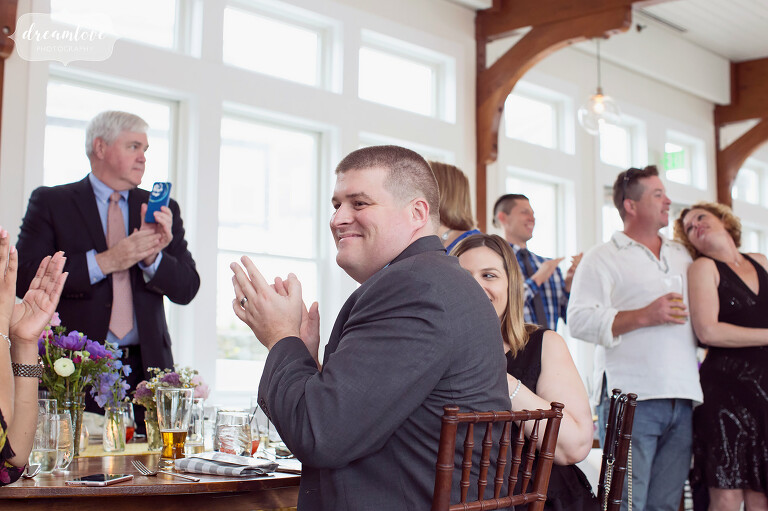 Guests enjoy the speeches at this luxury wedding venue on Cape Cod.
