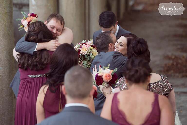 Documentary moments of guests congratulating newlyweds in Boston.
