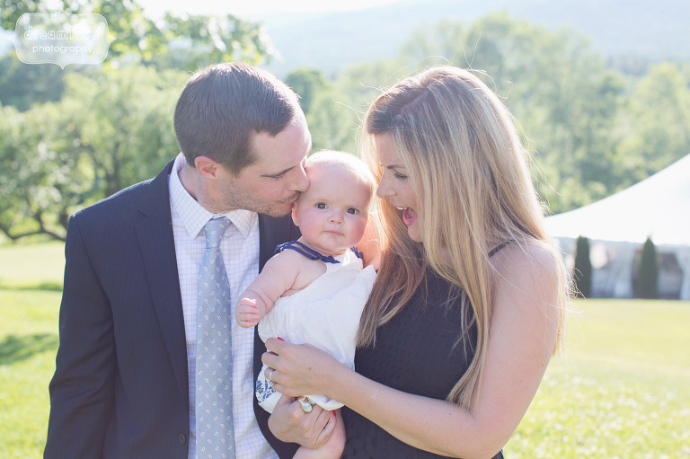Sweet family photo with baby at the Hildene Estate wedding venue in Manchester, VT.