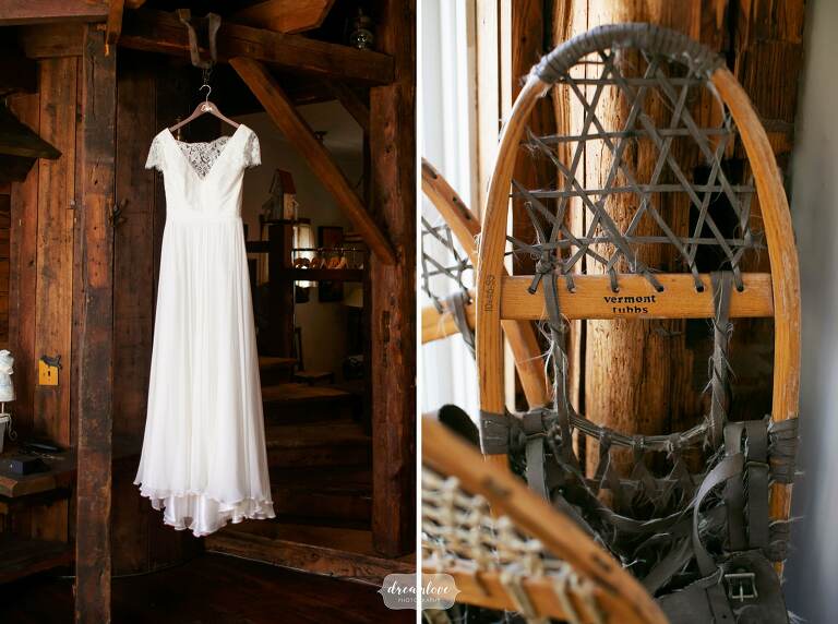 Bride's dress hanging in dark barn in Pittsfield, Vermont.
