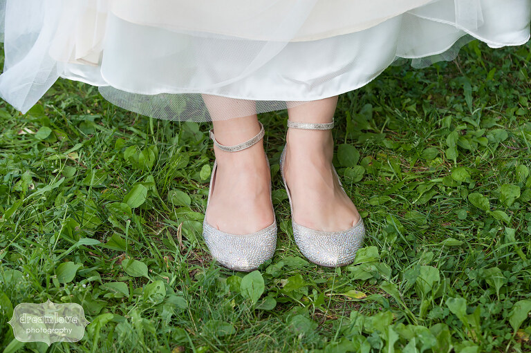 The bride shows off her sparkly flat shoes for the wedding at Sugarbush in VT.