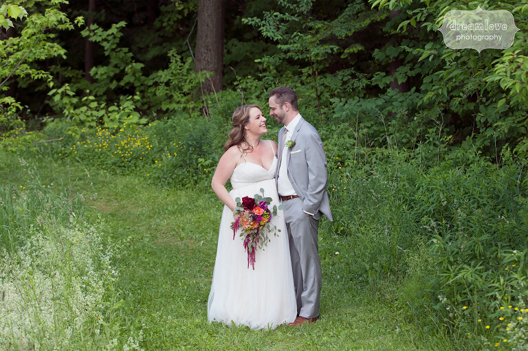 Sweet natural photo of the bride and groom after their Sugarbush, VT wedding.