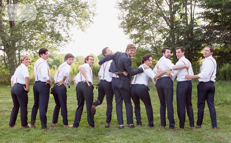 Funny photo of the groomsmen all sticking their butts out at the 1824 House in VT.