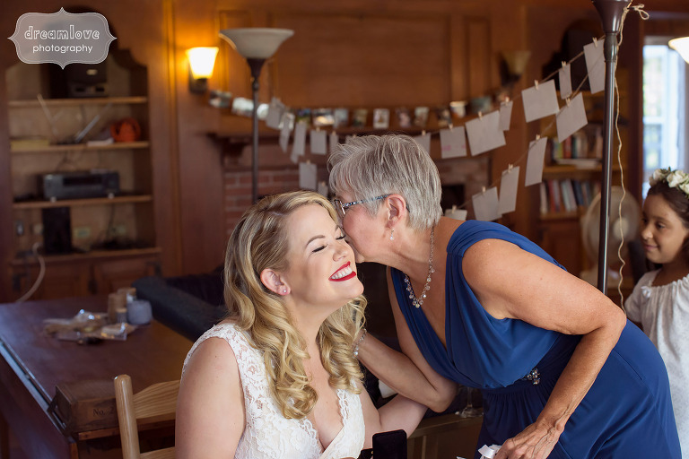 Candid wedding photo at this rustic Cape Cod wedding at Overbrook House