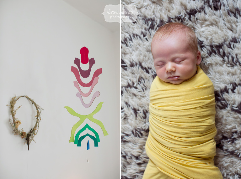 Modern baby photography in a yellow swaddle with colorful details in Venice, CA.