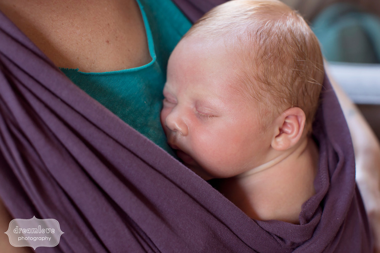 Newborn baby in a purple sling in Venice, CA
