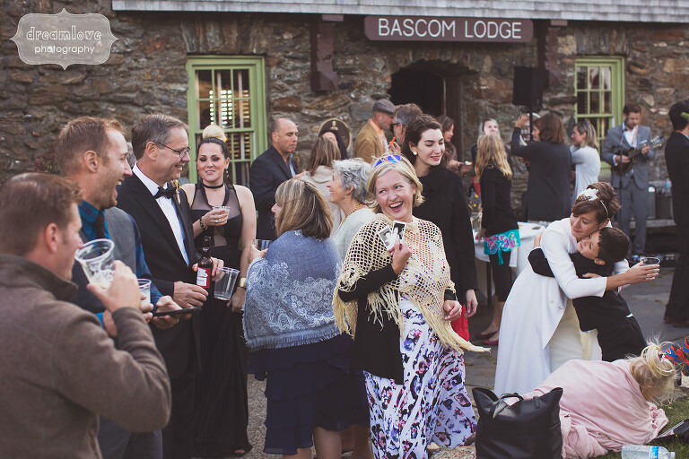 Guests mingle during the outdoor cocktail hour at the Bascom Lodge in Western MA.
