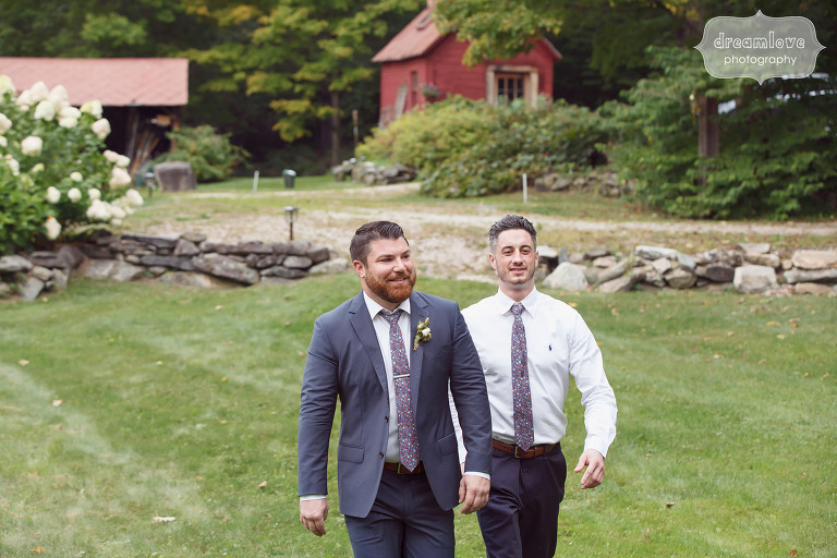 Dapper groom and groomsmen walk to the ceremony for Southern VT wedding.
