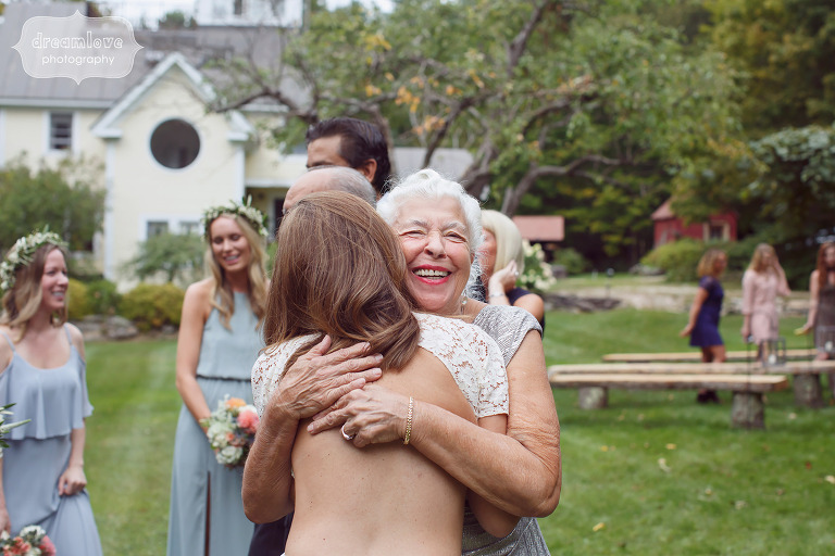 Documentary photo of the bride hugging her grandma after the ceremony in Quechee, VT.