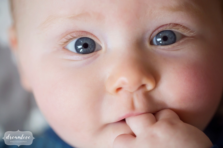 Close up photo of a six month old baby in Venice, CA with blue eyes.
