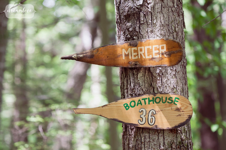 Rustic decor ideas for a lake wedding in NH using old canoe paddles.