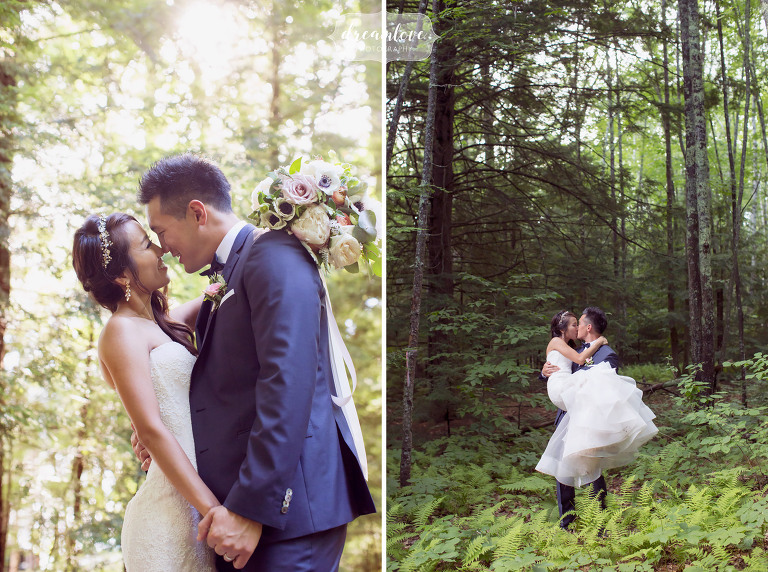 The groom carries his bride through the ferns in the forest after their outdoor wedding in Wolfeboro, NH.