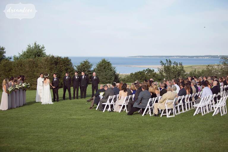 Wedding ceremony with an ocean view at the Crane Estate in MA.