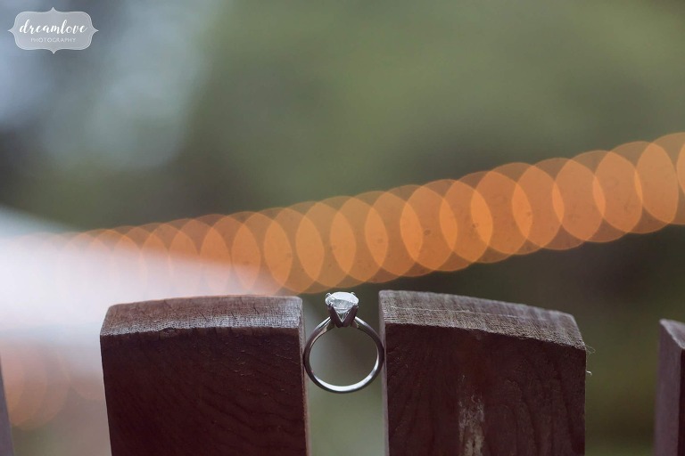 The engagement ring with bokeh cafe string lights.