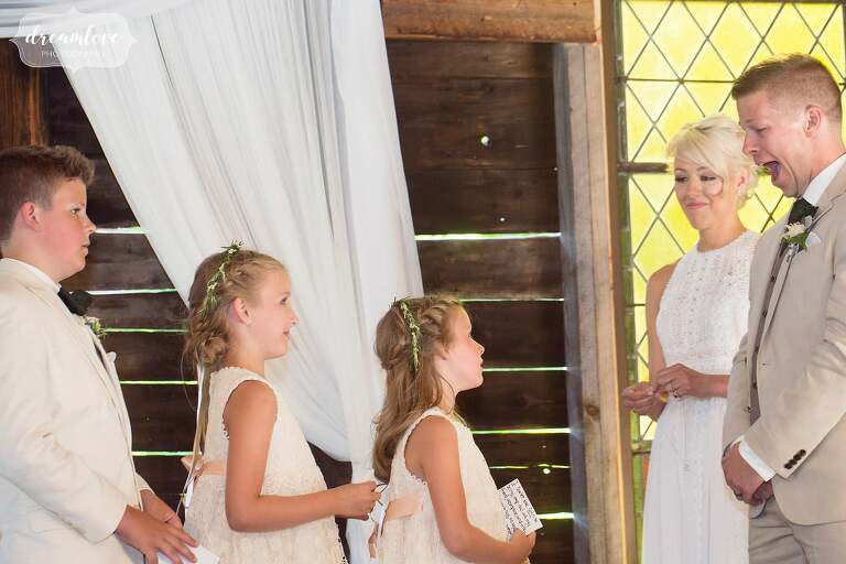 The children of the bride were included in this barn wedding ceremony.