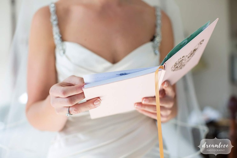 Bride reads the letter from groom at Windsor Mansion.