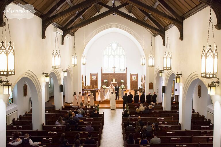 Wide view of the inside of the St. Denis church for a wedding ceremony in Windsor, VT.