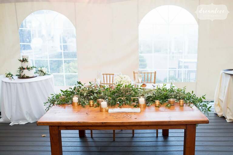 Greenery on tablescape at Windsor Mansion venue.