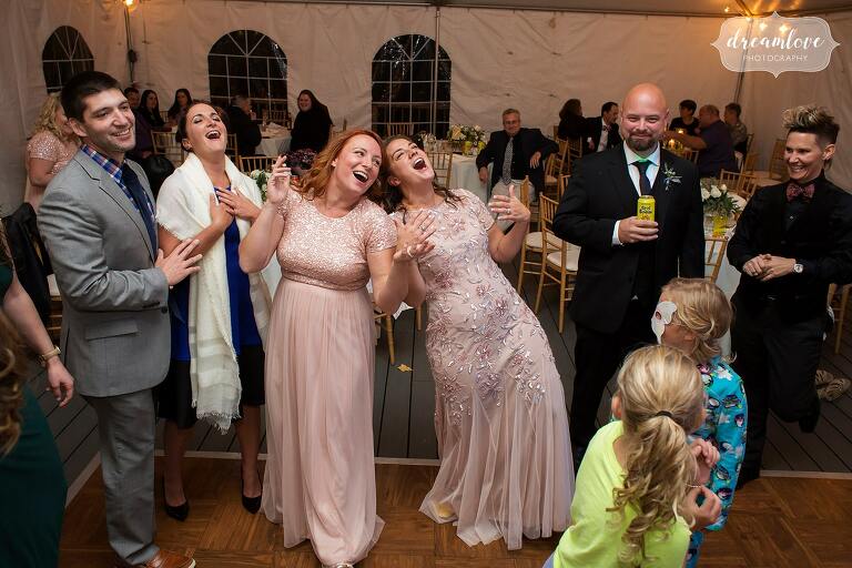 Funny dance photos of bridesmaids in Windsor, VT.