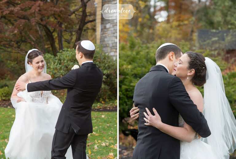 Emotional first look between bride and groom before Jewish wedding in Boston, MA.