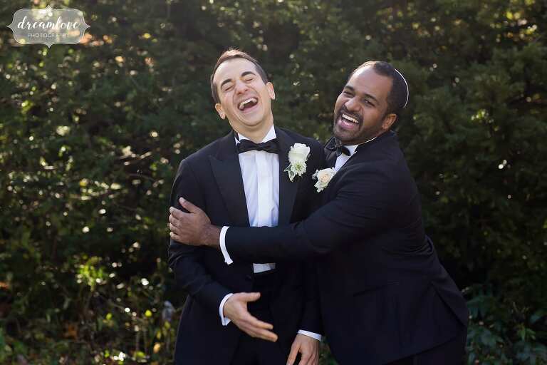 Funny photos of groom with best man in Newton, MA.