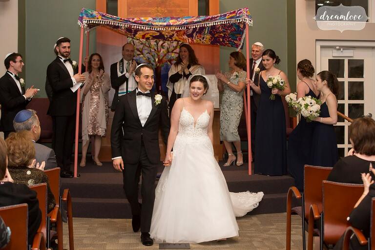 Happy Boston Jewish wedding photography at Temple Shir Tikva.