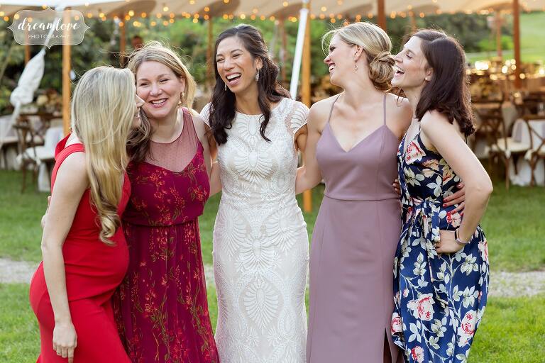 Happy bride with colorful friends at Lyman Estate.