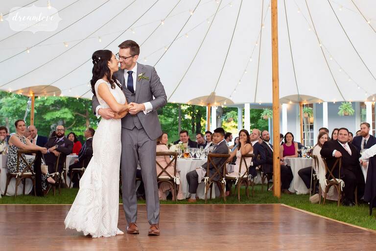 Bride and groom have their romantic first dance under Lyman Estate tent.