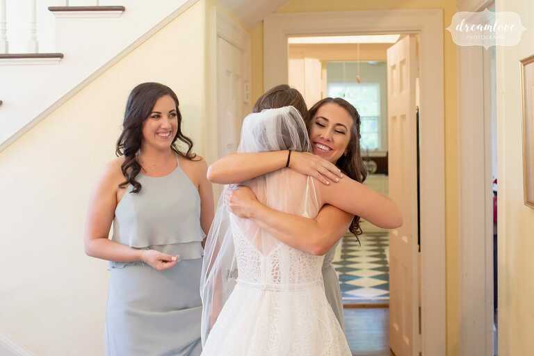bridesmaids-hug-bride-ipswich-ma-wedding