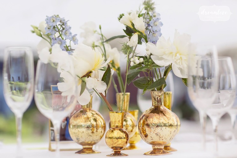 Gold flower vases wedding table decor.