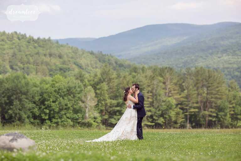 Rustic Western Mass wedding bride and groom stand field at Warfield House.