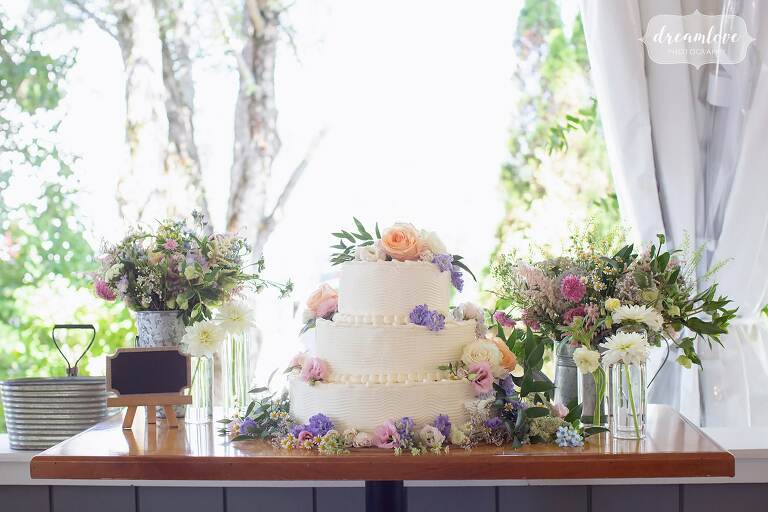 Rustic floral wedding cake at the Warfield House Inn.