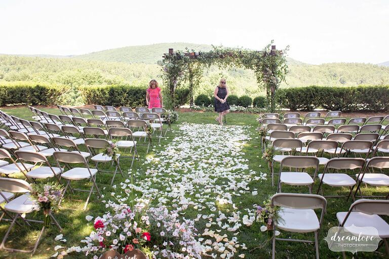 Flower petal wedding ceremony aisle at the Warfield House Inn.